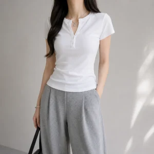 Áo thun ôm body đính nút nữ