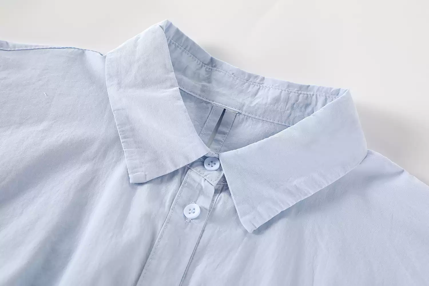 Áo Sơ Mi Nữ Xanh Nhạt Dáng Rộng Cách Điệu Vạt Chéo Cao Cấp - Ảnh 2
